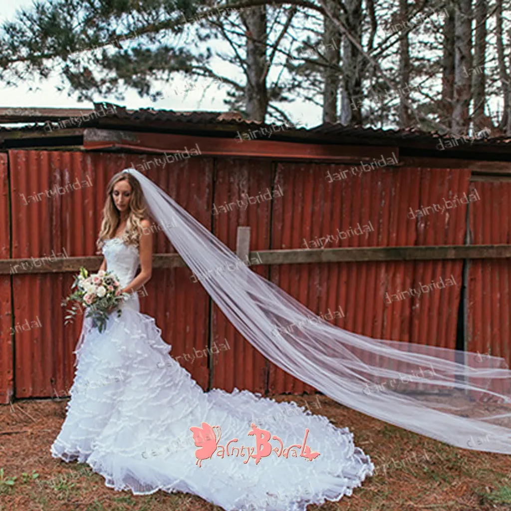 White Lace Tiered Chapel Train Wedding Gown