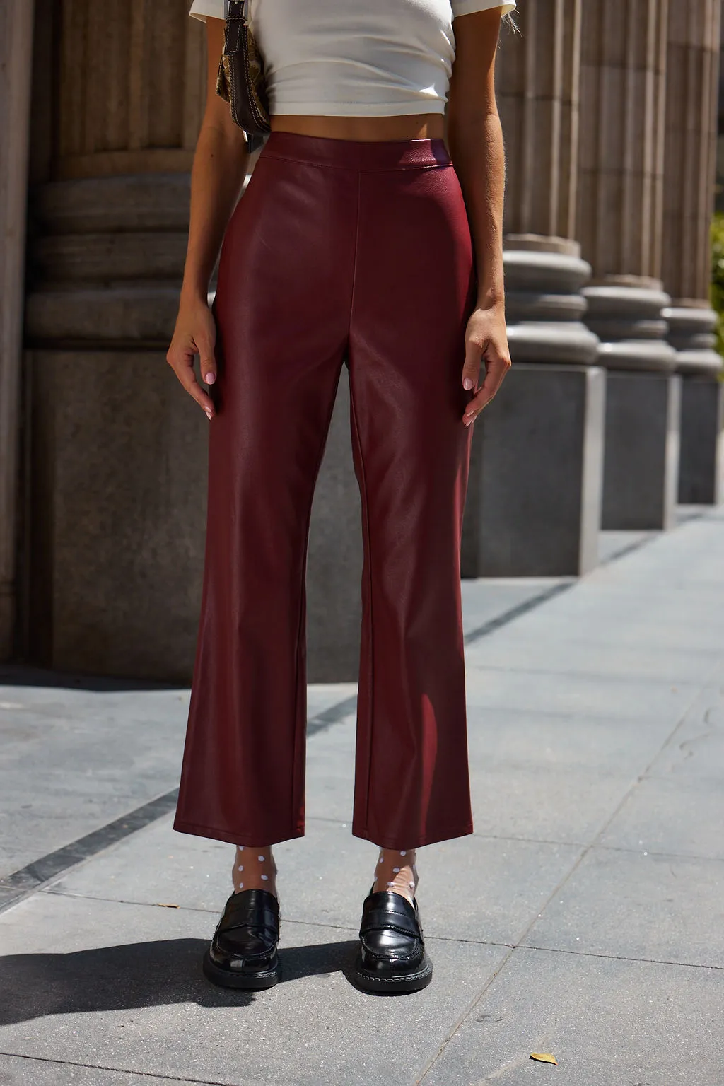 Burgundy faux leather pants