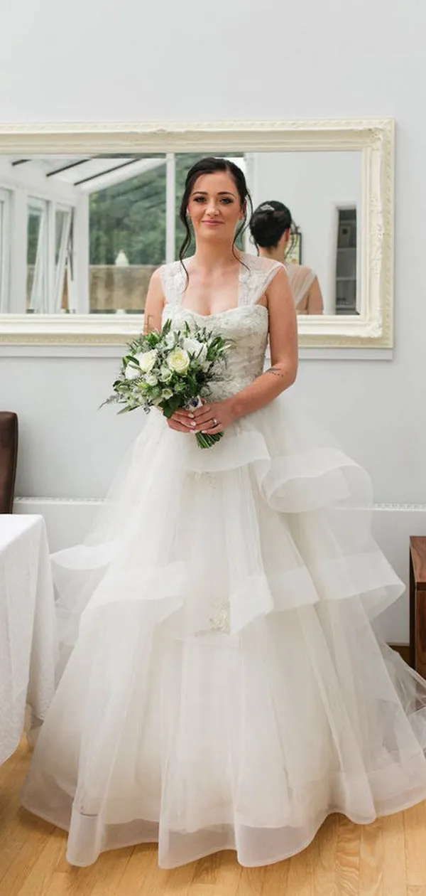 Ivory Ruffles Organza Applique Sleeveless Tiered Ball Gown Wedding Dress