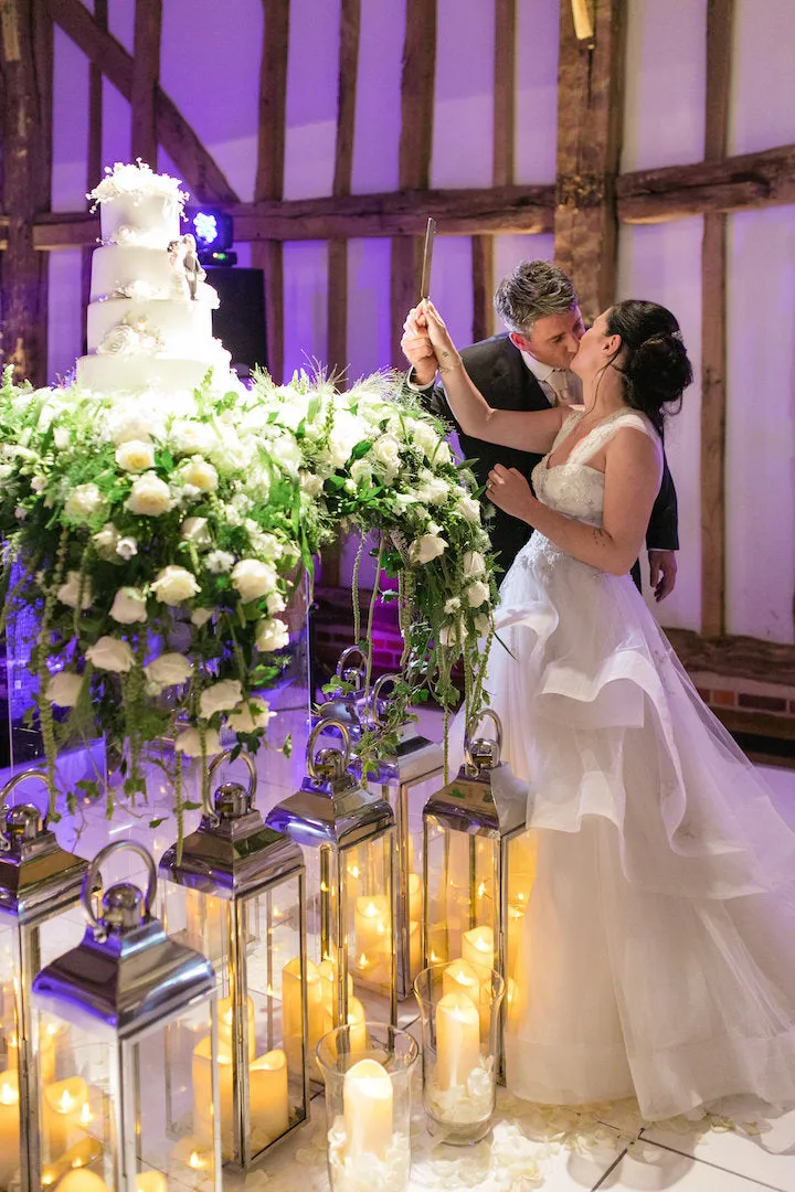 Ivory Ruffles Organza Applique Sleeveless Tiered Ball Gown Wedding Dress