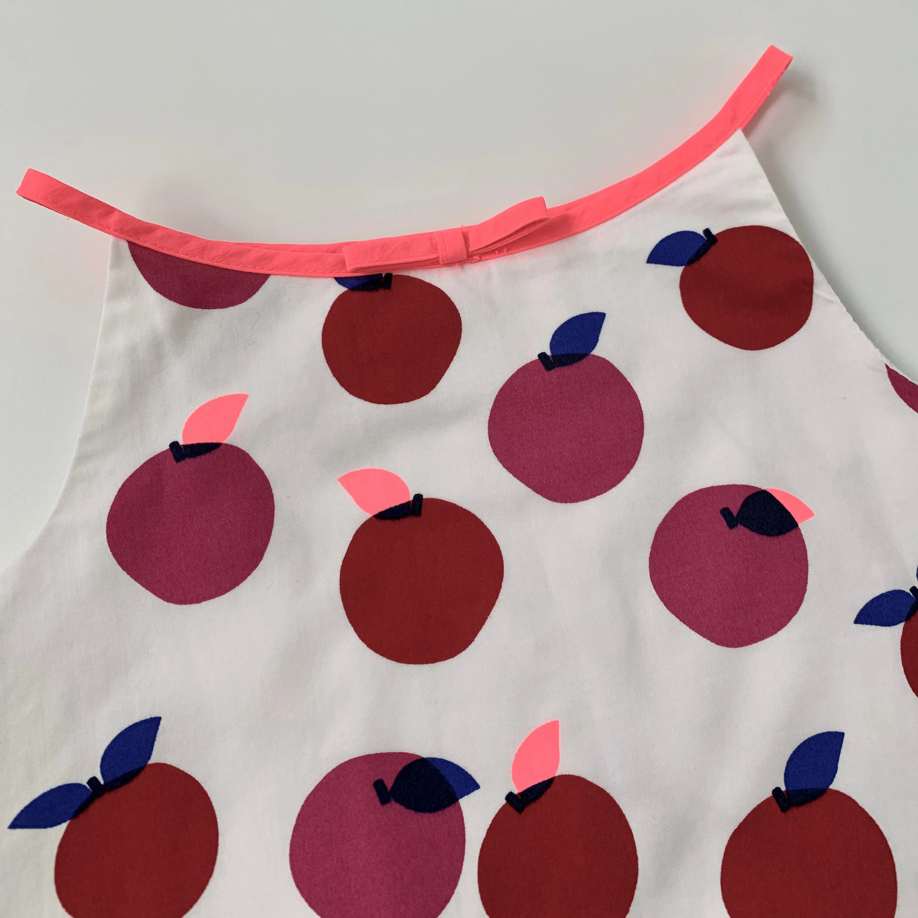 5-Year-Old Jacadi Apple Print Summer Top Adorned with Neon Bow