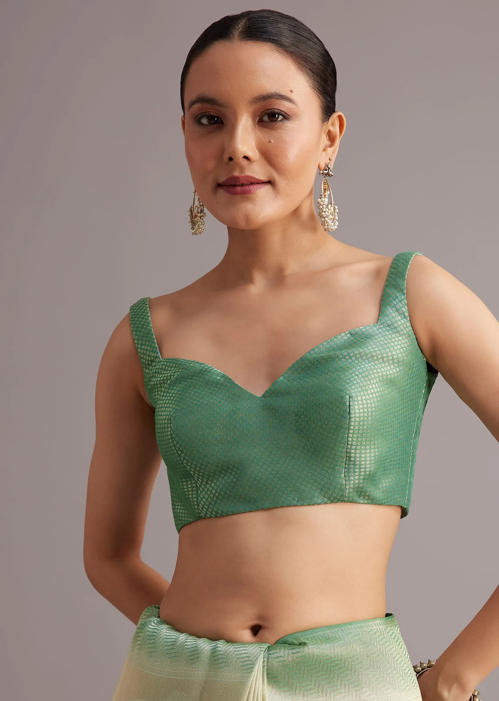 Sea Green Tissue Silk Floral Motif Saree With Contrast Pallu And Border